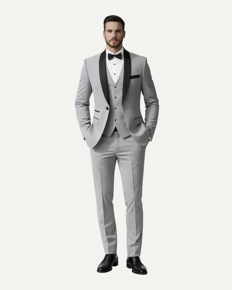 Male model wearing light grey three piece tuxedo suit with bow tie formal outfit full body