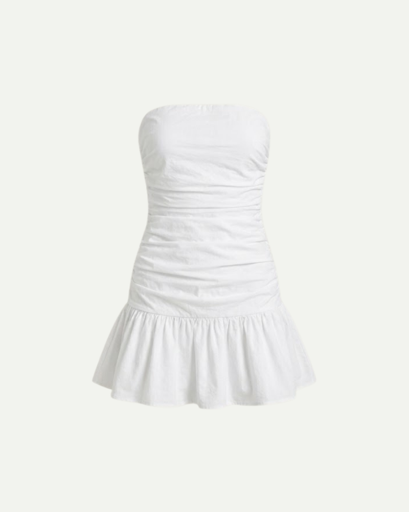 Women’s white strapless mini dress with ruched bodice and ruffled A-line hem