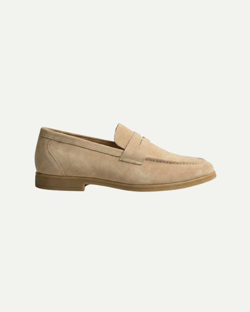 Men’s beige leather slip-on loafers with classic low-profile silhouette by Aveloire