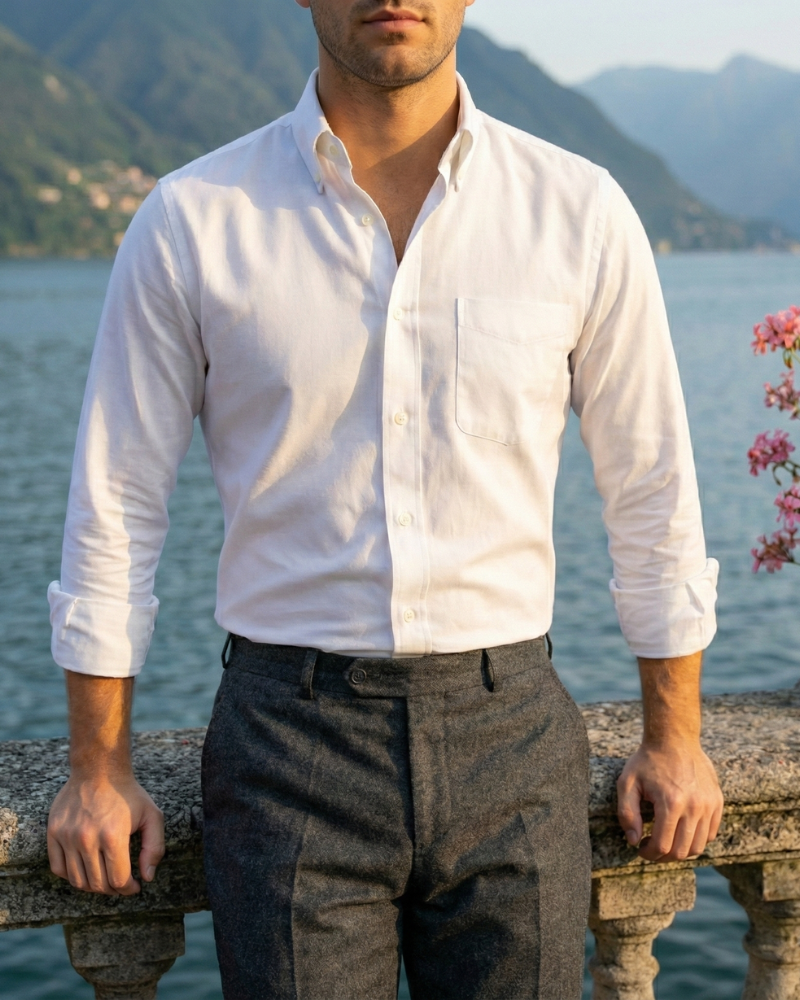 Men’s white linen button down shirt styled with dark trousers
