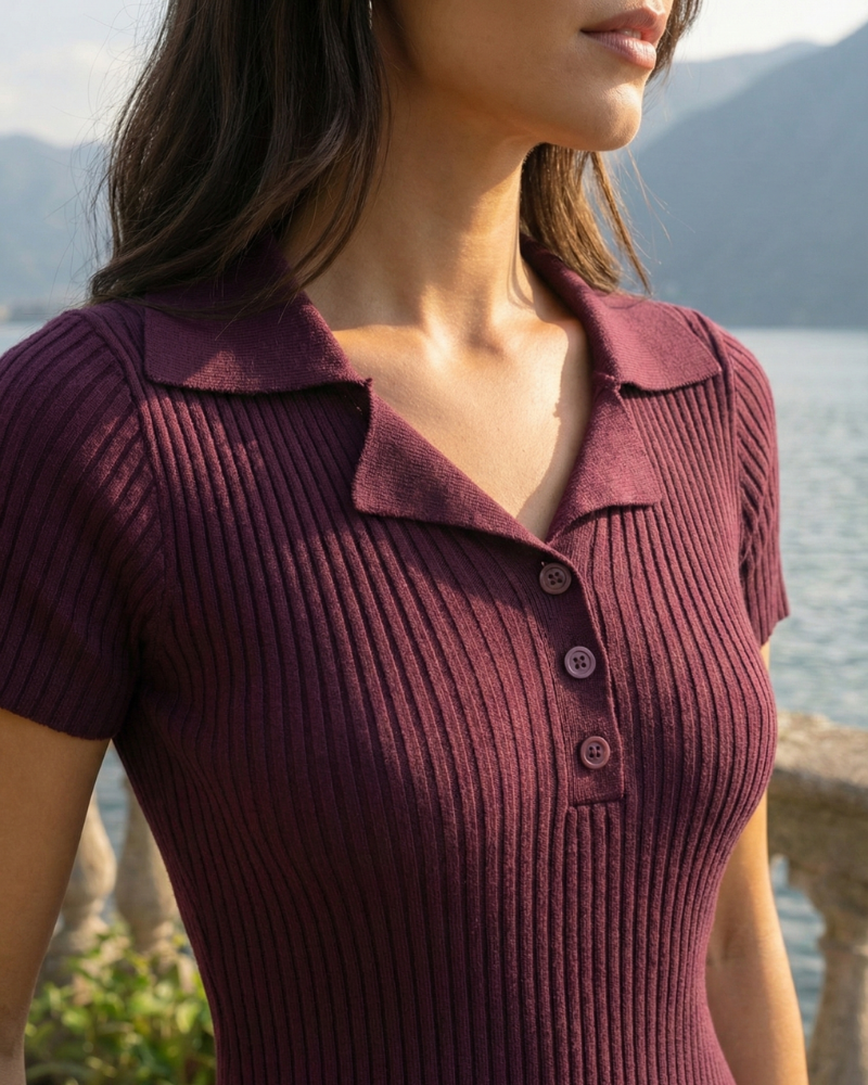 Close-up of burgundy ribbed polo midi dress collar and button placket