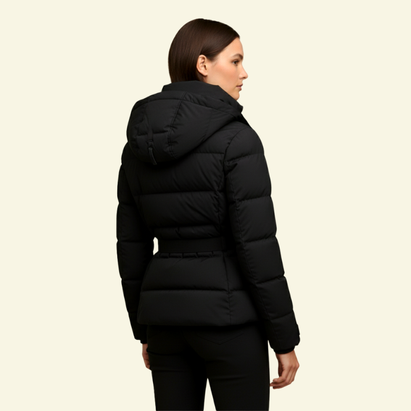 Black puffer coat for women, belted waist seen from the back on model — Aveloire