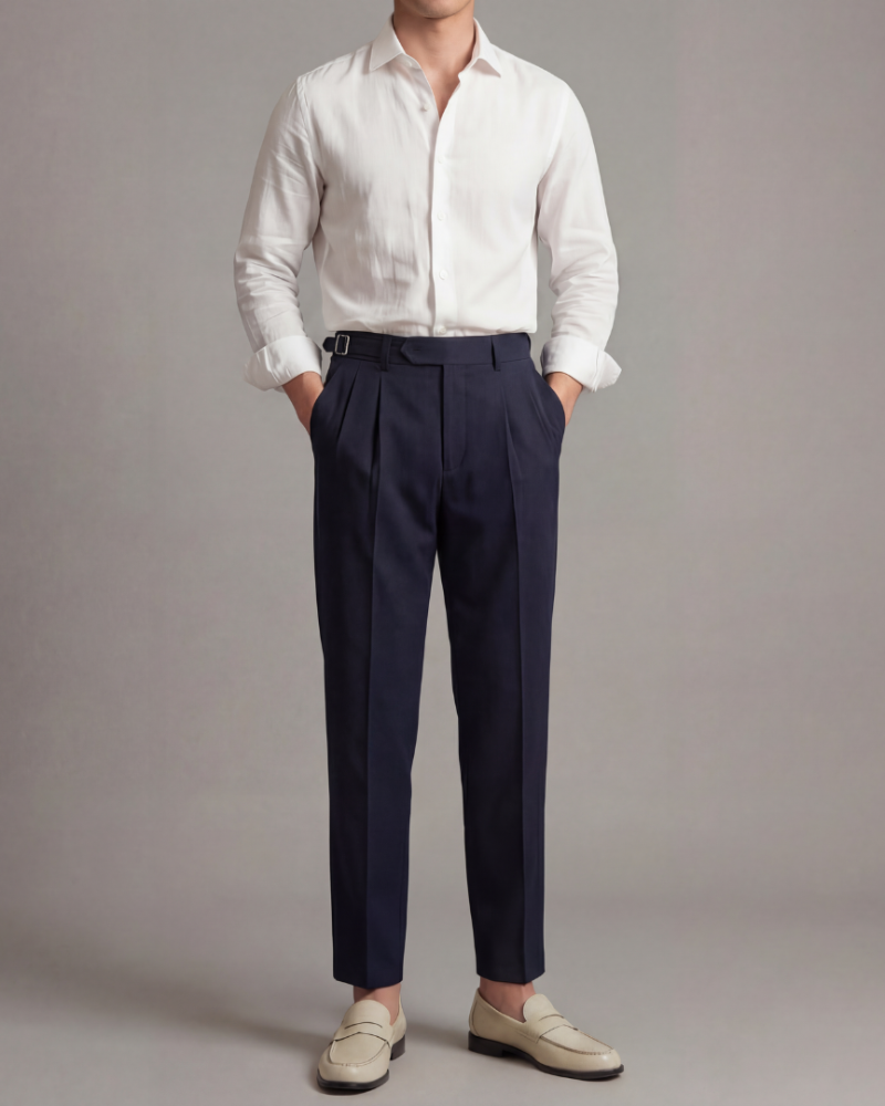 Male model wearing navy tailored dress trousers pleated straight fit formal casual outfit