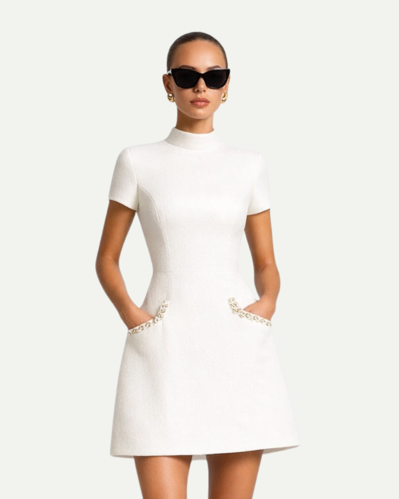 Female model wearing white tweed mini dress front view elegant short sleeve dress