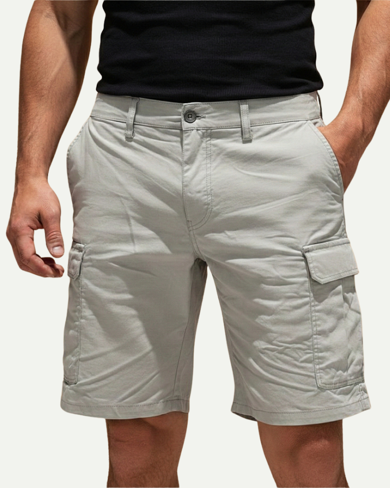male model wearing light grey cargo shorts front view utility pockets Lubomirske