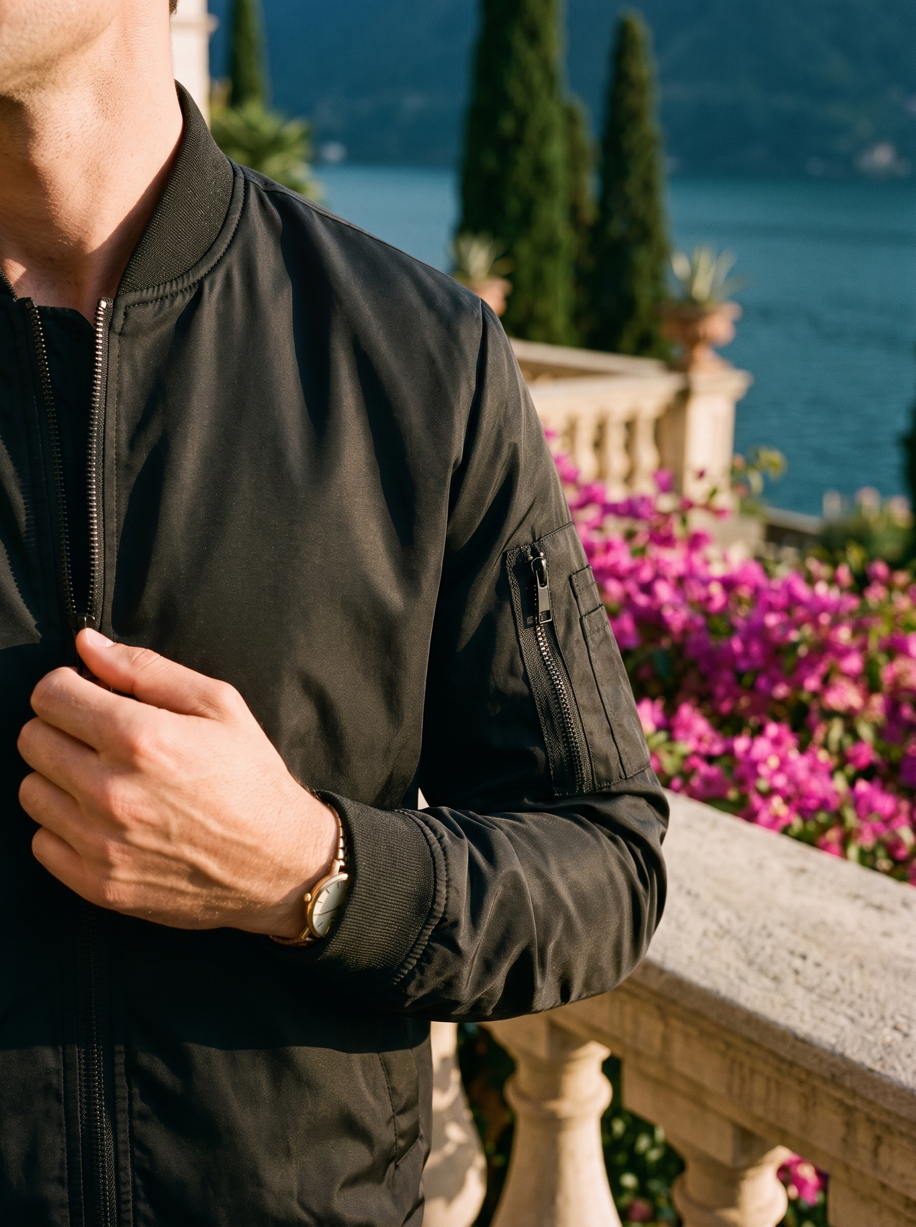 Black nylon bomber jacket collar zip detail — Aveloire