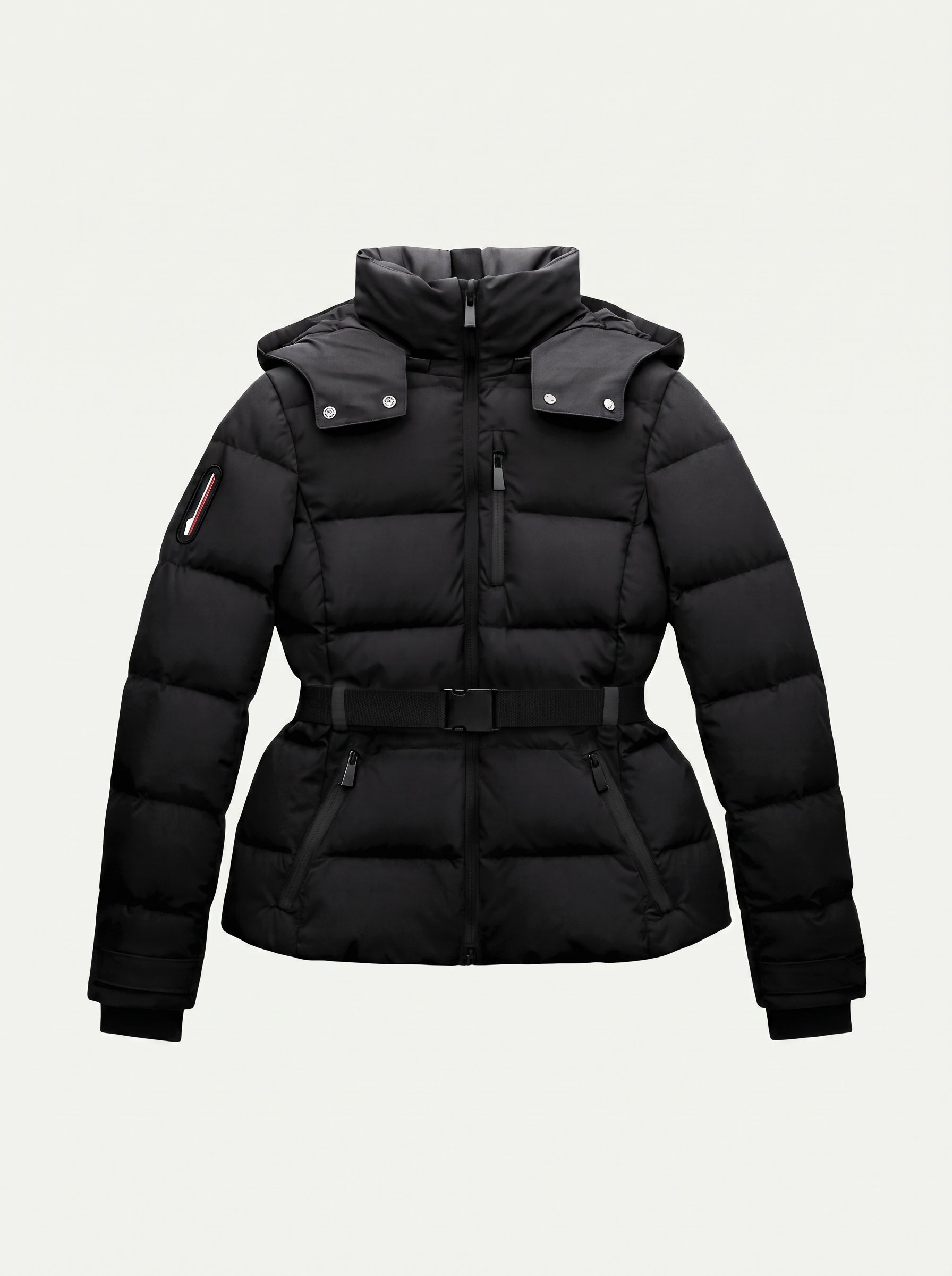 Black belted puffer coat for women, flat lay — Aveloire