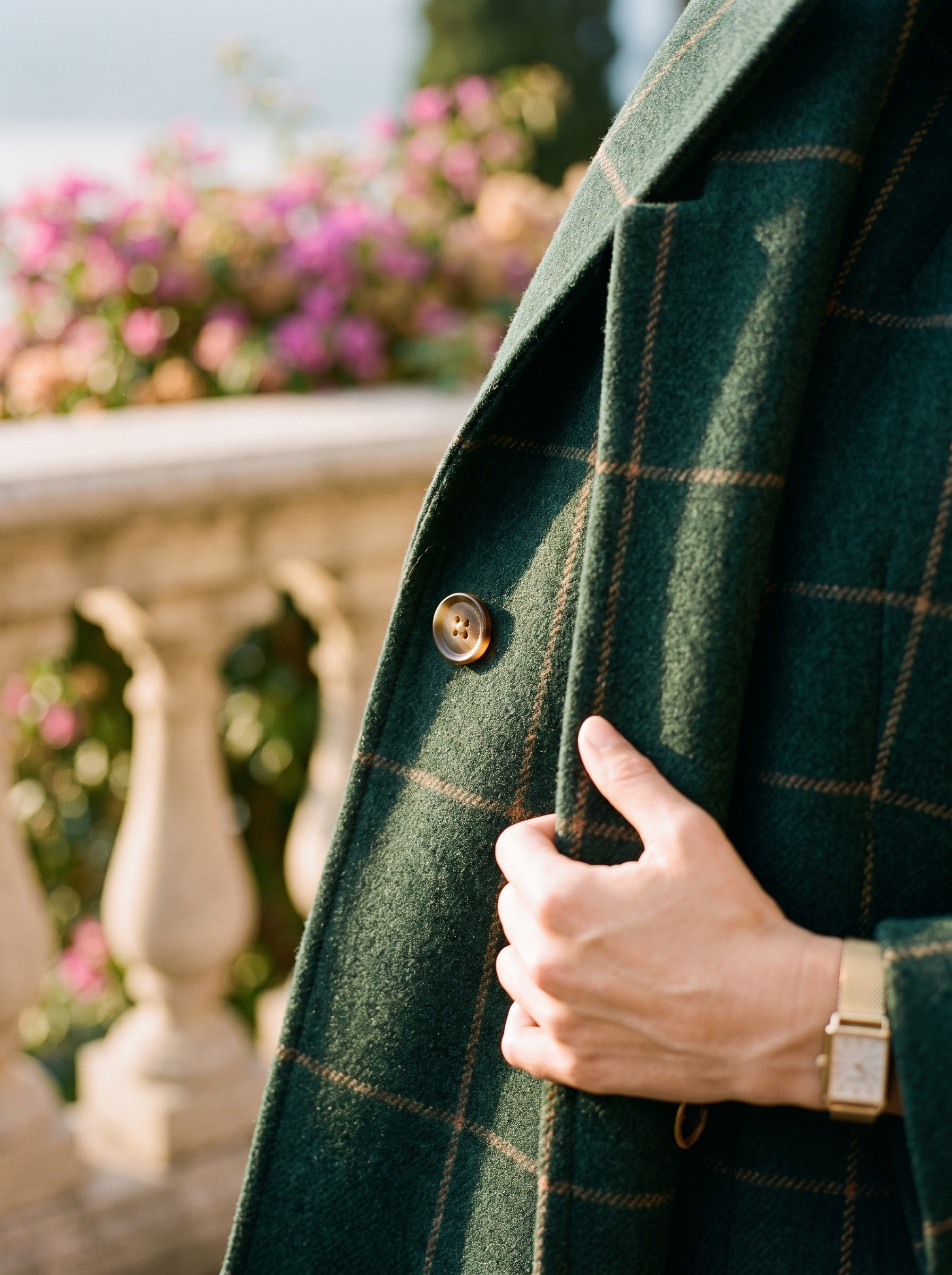 Close-up of the tan windowpane check on a forest-green wool coat — Aveloire