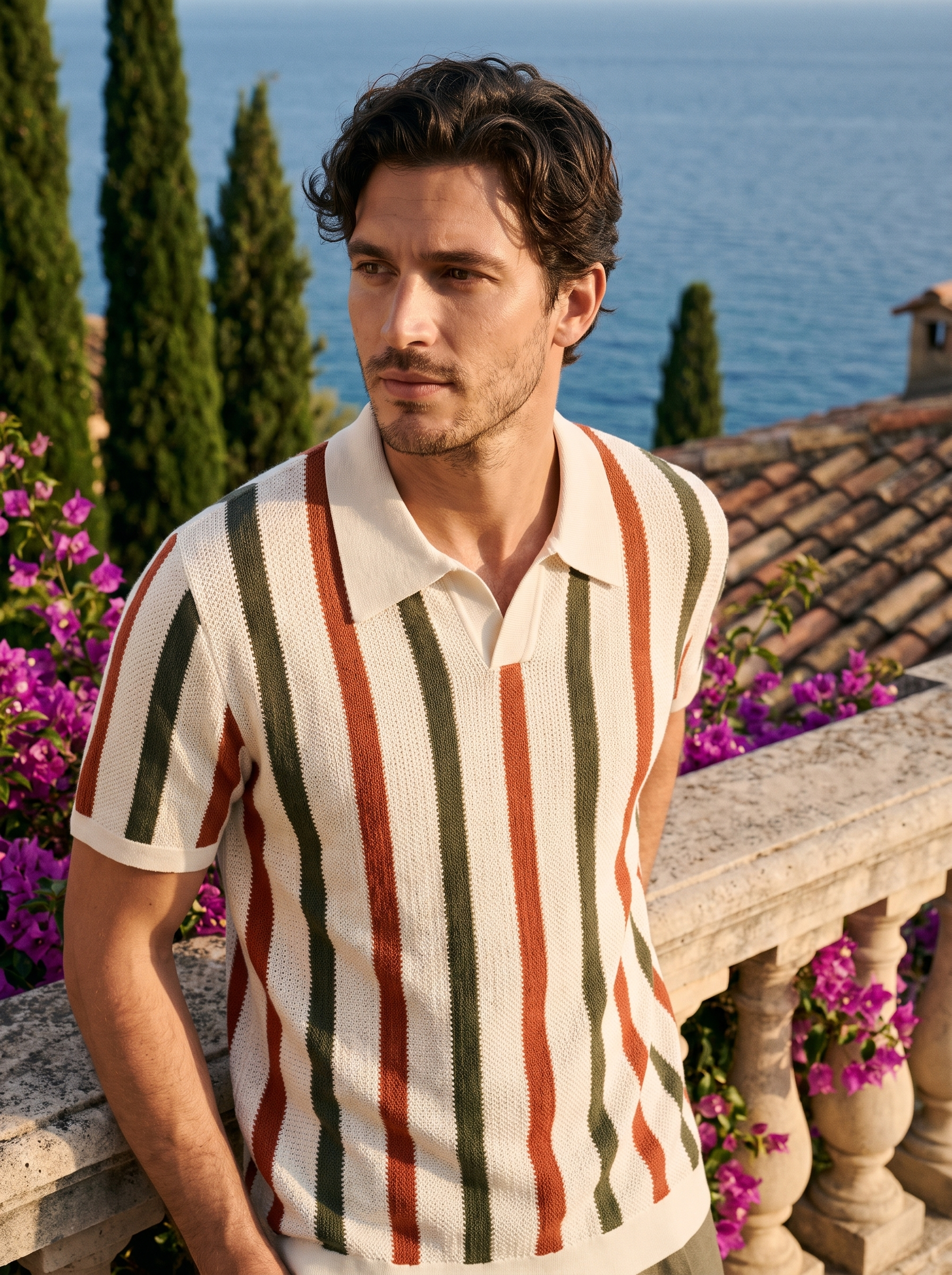 Man wearing a cream striped knit johnny-collar polo on a balcony overlooking Lake Como, old money style — Aveloire