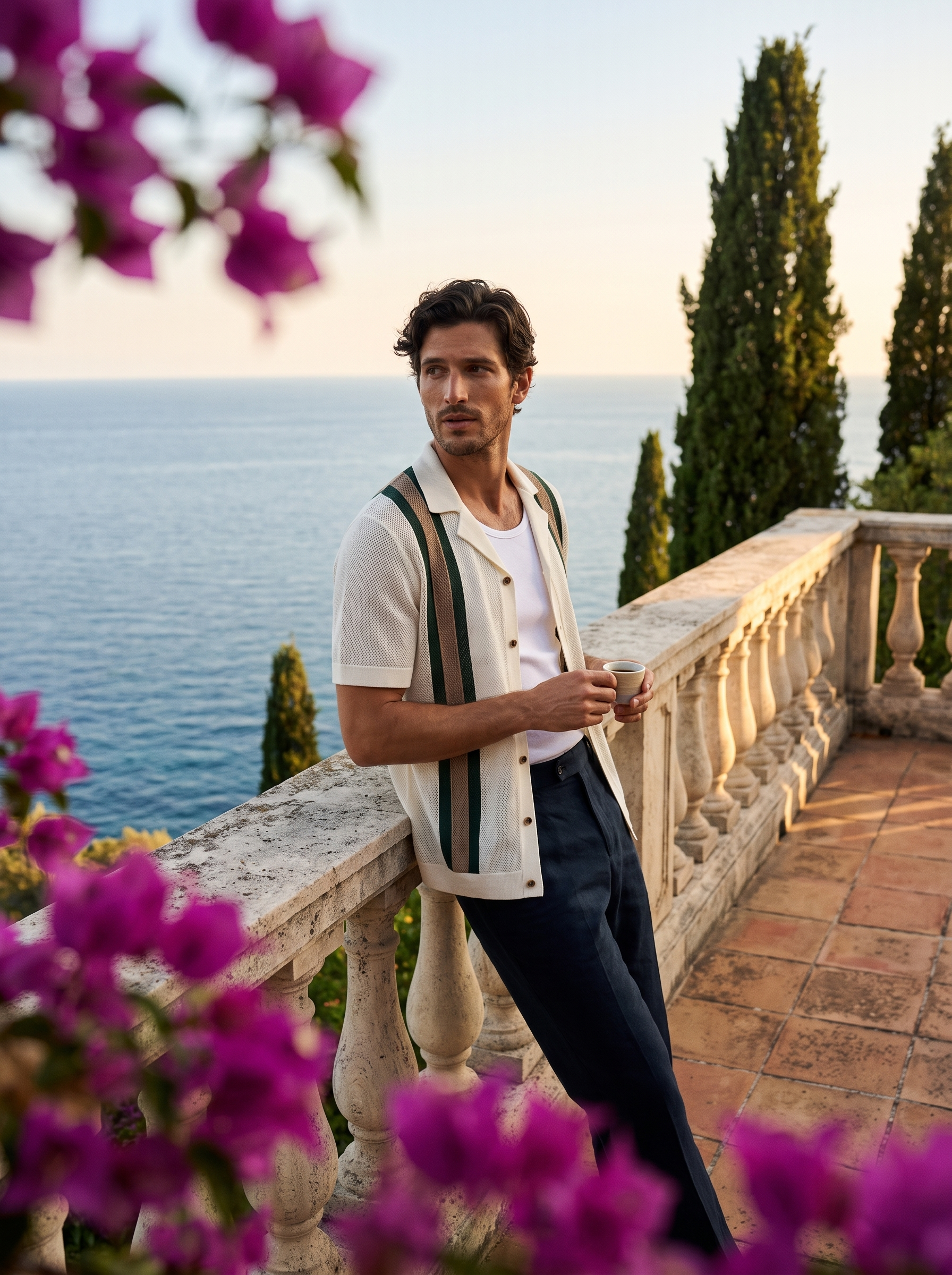 Man in an ivory striped open-knit camp collar shirt with an espresso on a Lake Como terrace, old money lifestyle — Aveloire