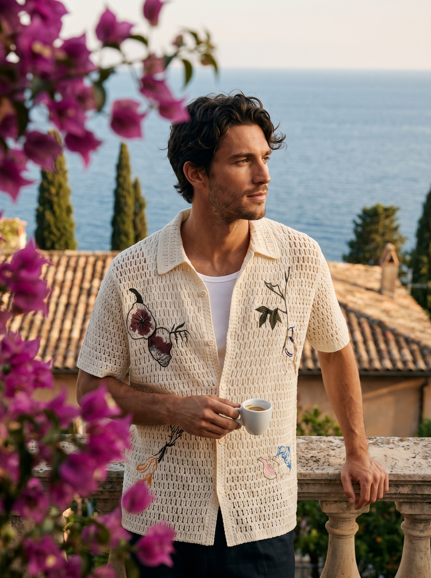 Man in an ivory embroidered crochet shirt with an espresso on a Lake Como terrace, old money lifestyle — Aveloire