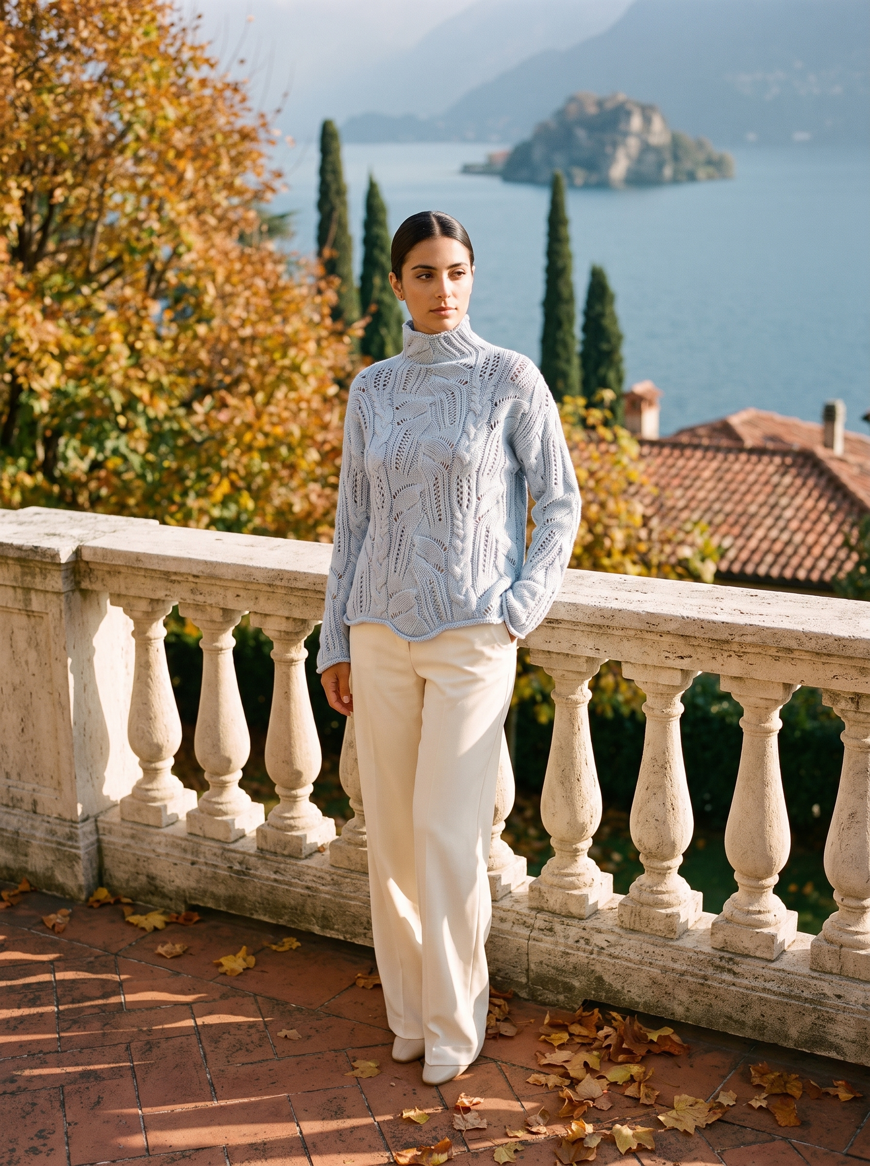 Light blue openwork knit turtleneck sweater, full front view on model — Aveloire