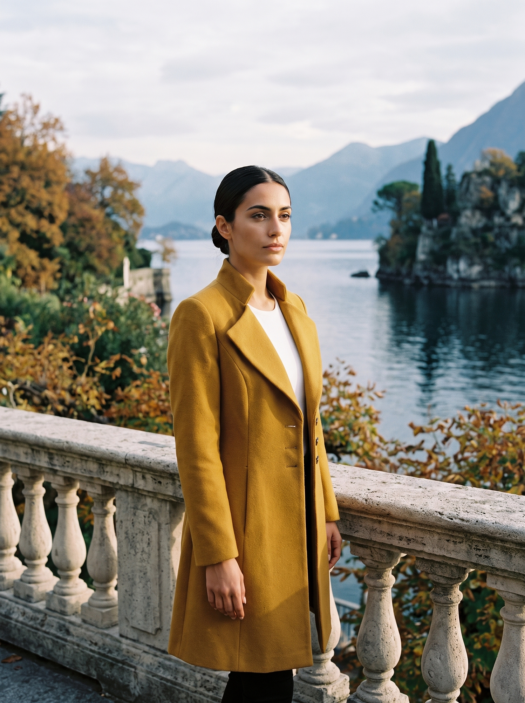 Mustard ladies overcoat, worn on a Lake Como terrace — Aveloire