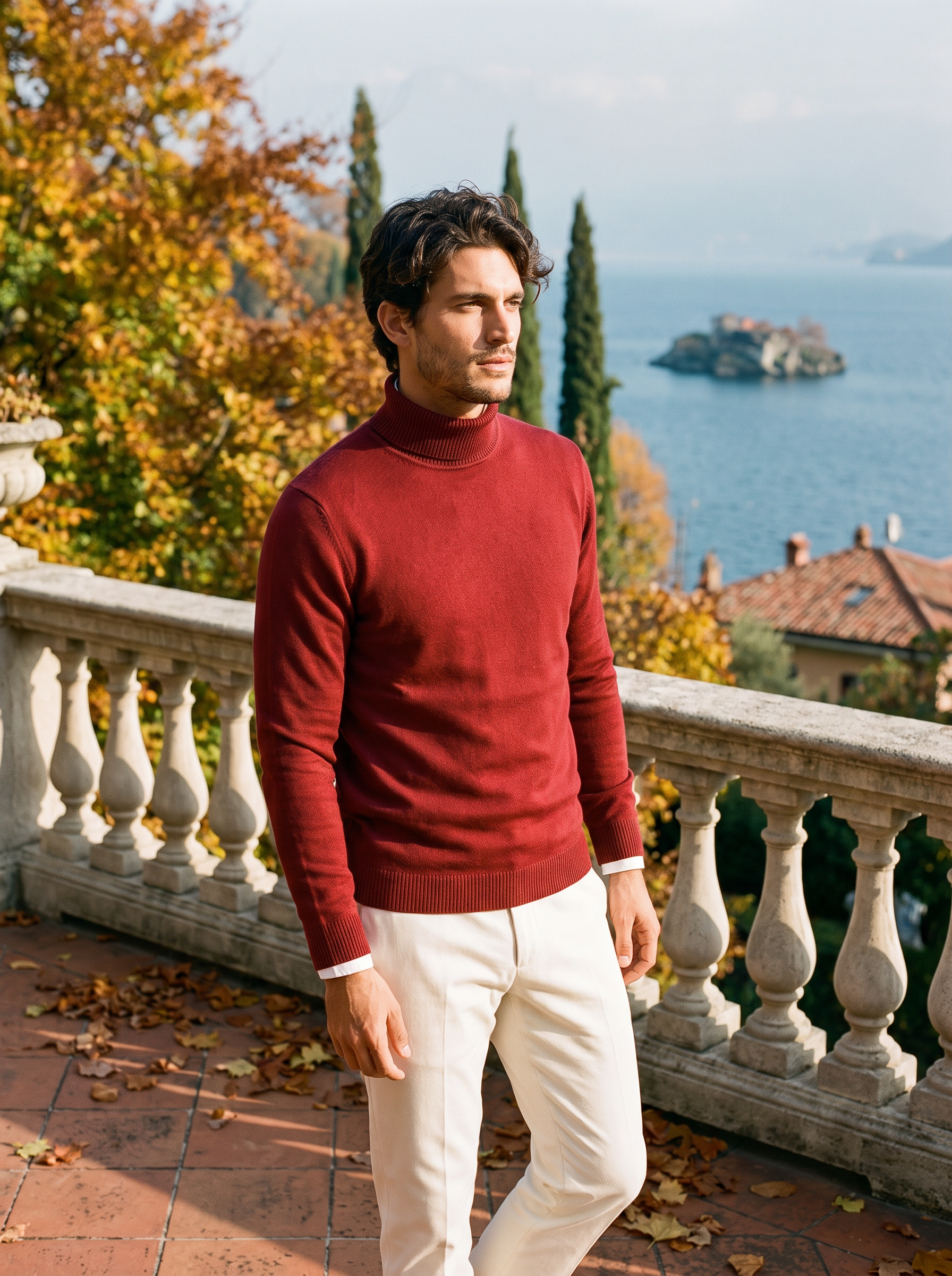 Man wearing a red wool turtleneck sweater by Lake Como — Aveloire