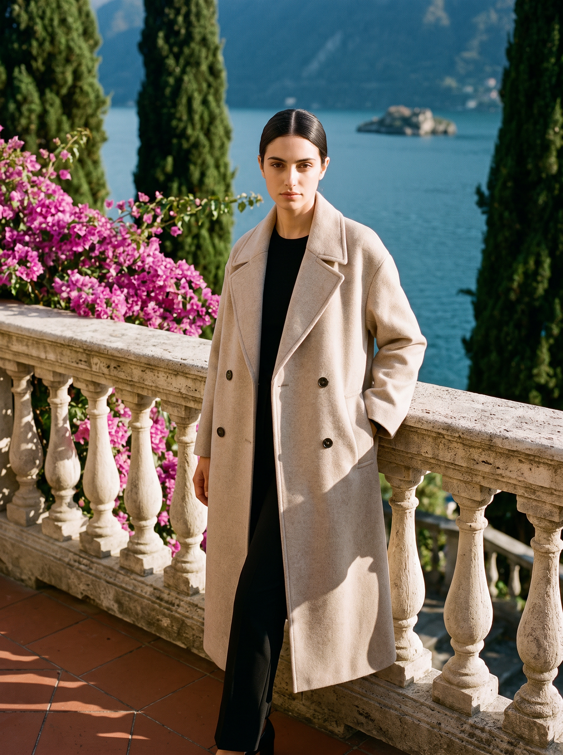 Full-length front view of an oatmeal wool overcoat on a Lake Como terrace — Aveloire