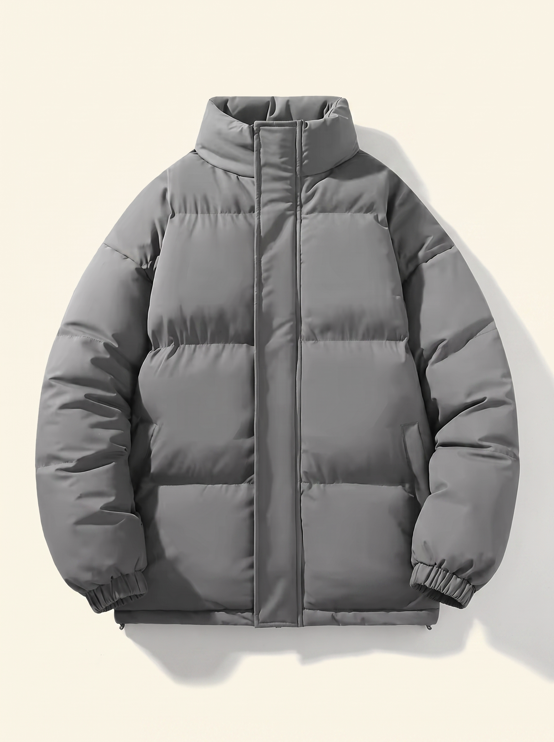 Light gray puffer jacket for men, flat lay — Aveloire
