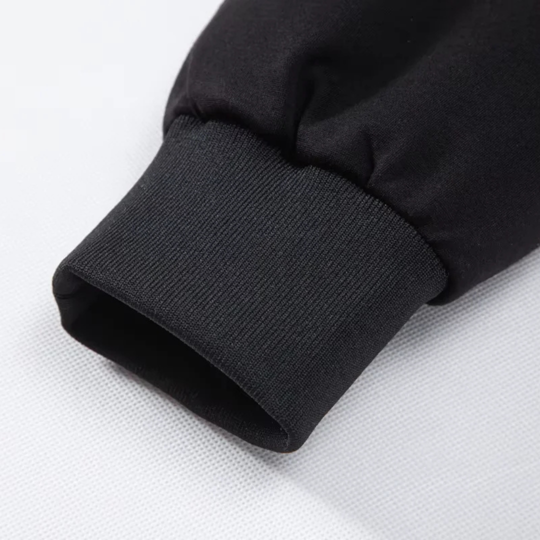 Close-up of the ribbed knit cuff on the down puffer jacket — Aveloire
