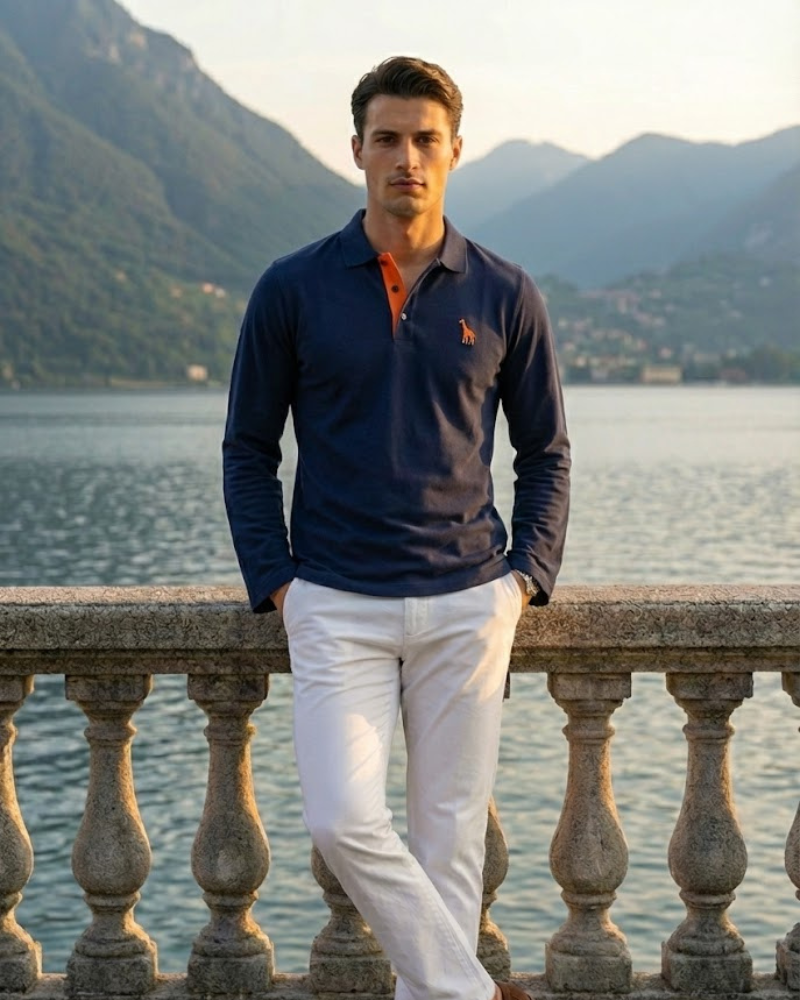 Men’s navy long sleeve embroidered polo shirt styled with light trousers