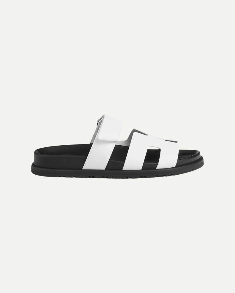 Black and white unisex velcro strap flat slide sandals with minimalist design by Aveloire