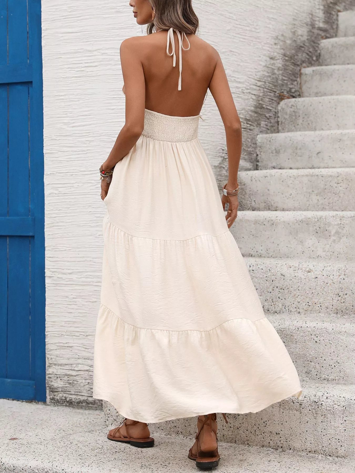 Beige halter maxi dress women back view sleeveless flowing summer dress
