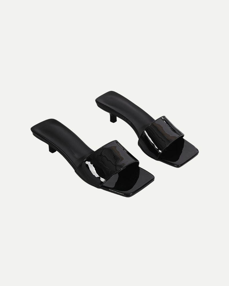 Women’s black open toe kitten heel slip-on sandals angled product view