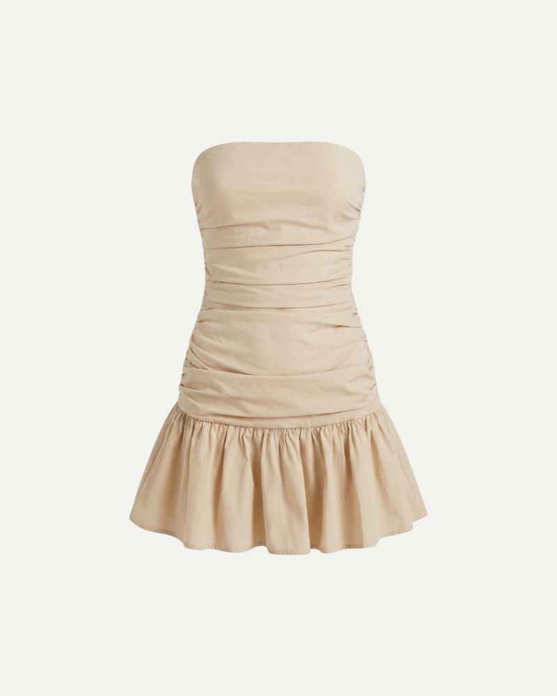 Women’s beige strapless mini dress with ruched bodice and ruffled A-line hem