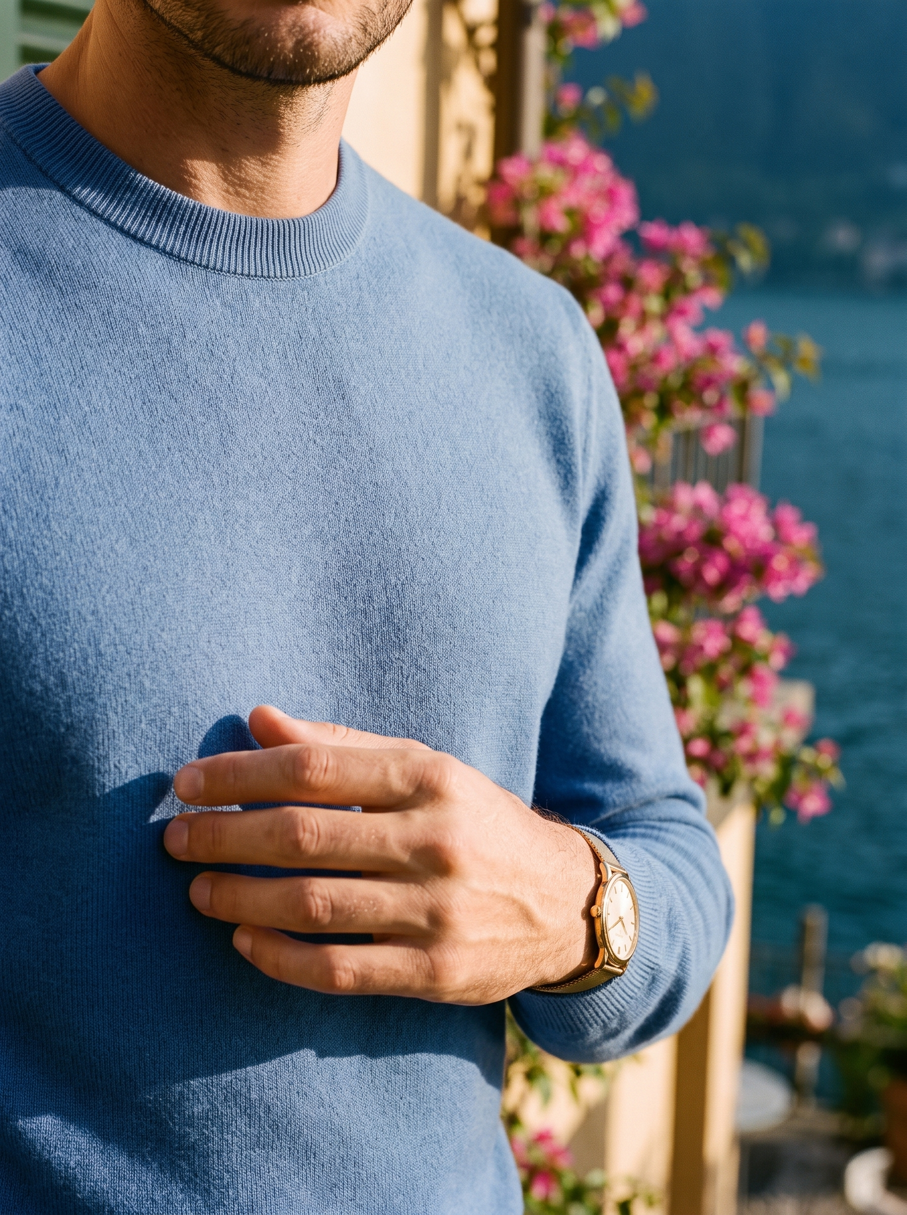 Ribbed crew neck collar and fine-gauge wool knit detail of a blue sweater — Aveloire
