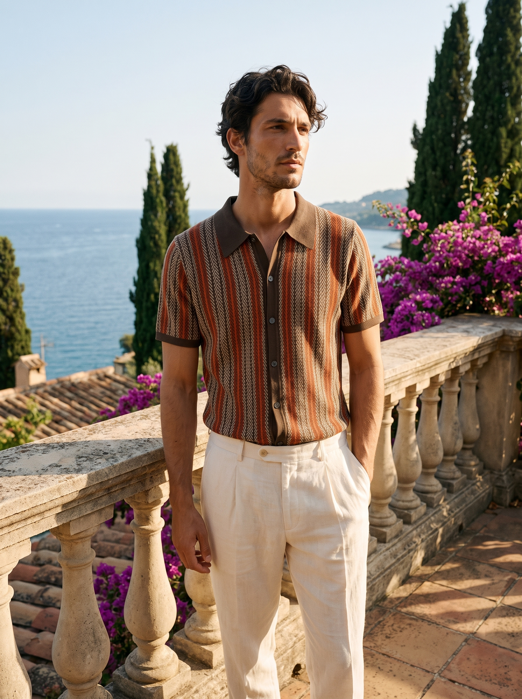 Full-length shot of a man in a brown striped knit button polo at Lake Como — Aveloire