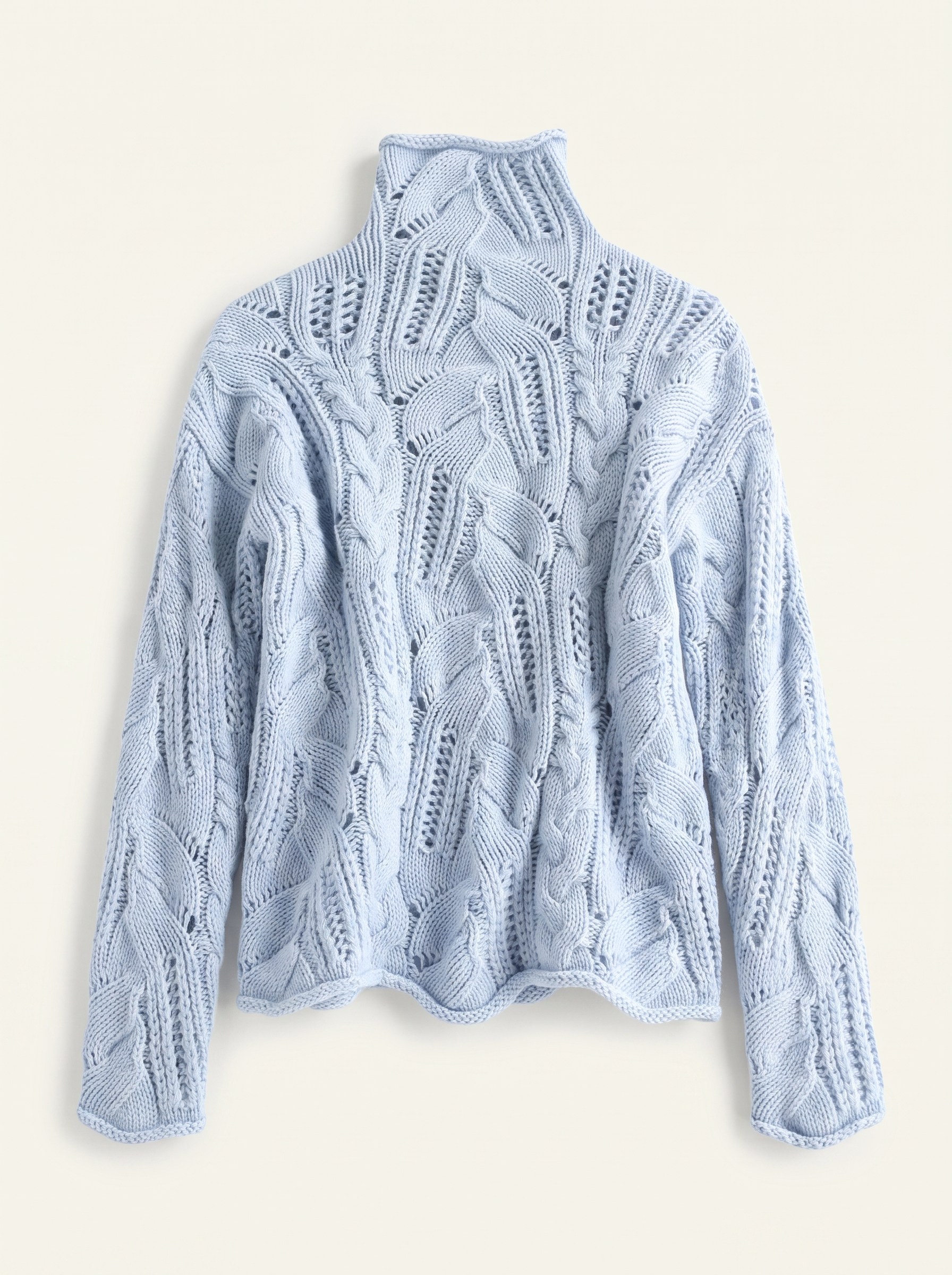 Light blue oversized pointelle knit turtleneck sweater flat lay product photo — Aveloire