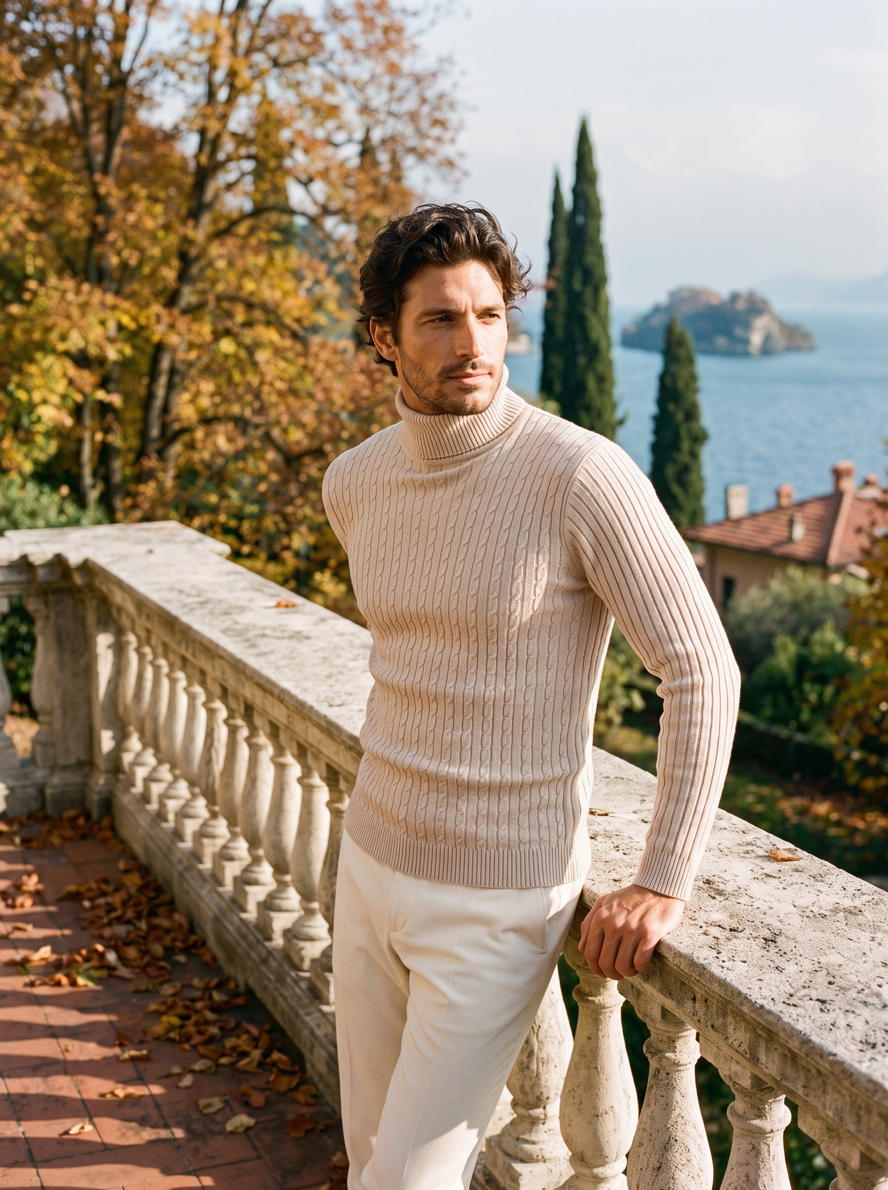 Man wearing a beige cable knit turtleneck sweater by the lake — Aveloire