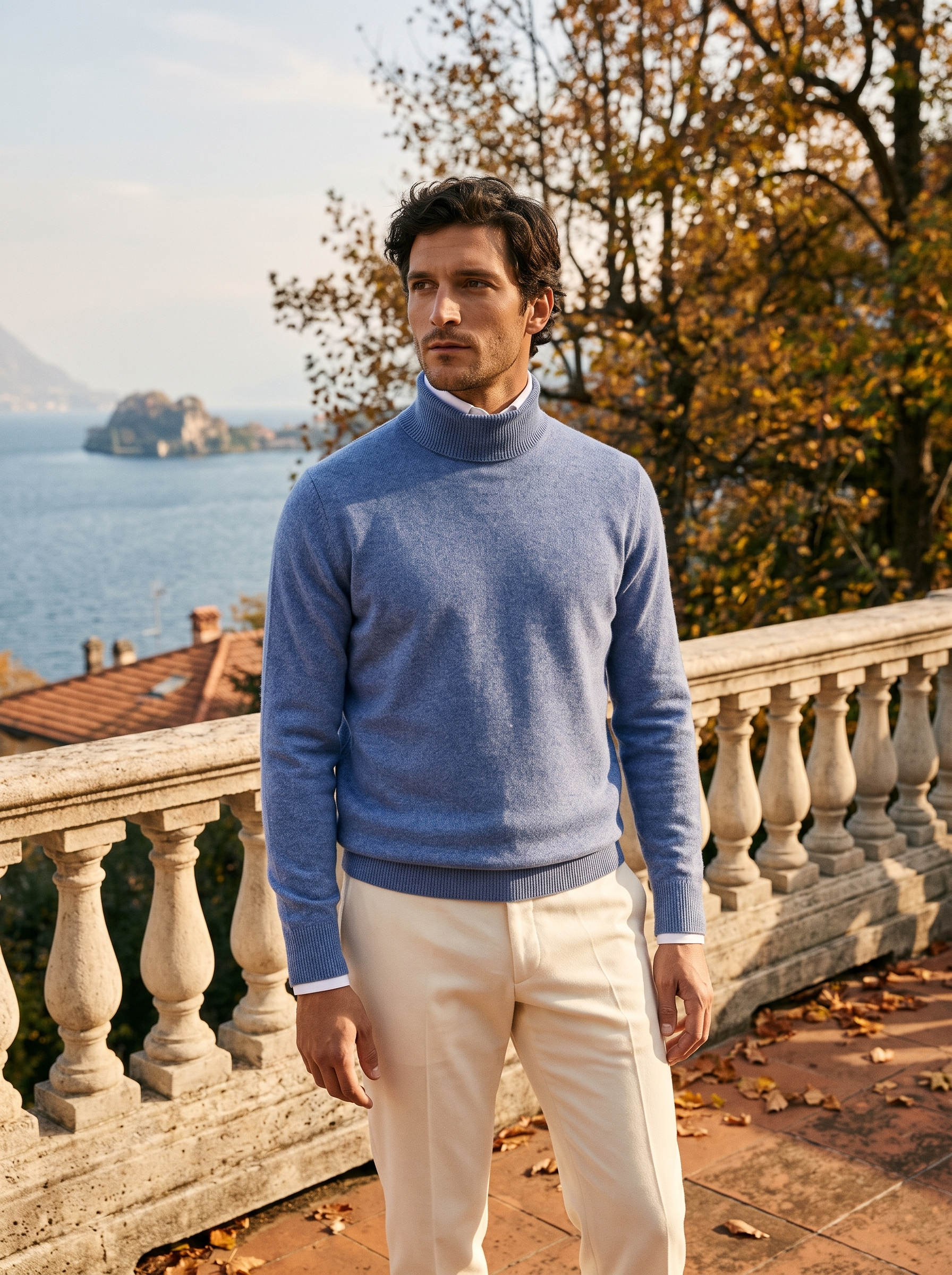 Man wearing a denim blue pure wool turtleneck sweater by Lake Como — Aveloire