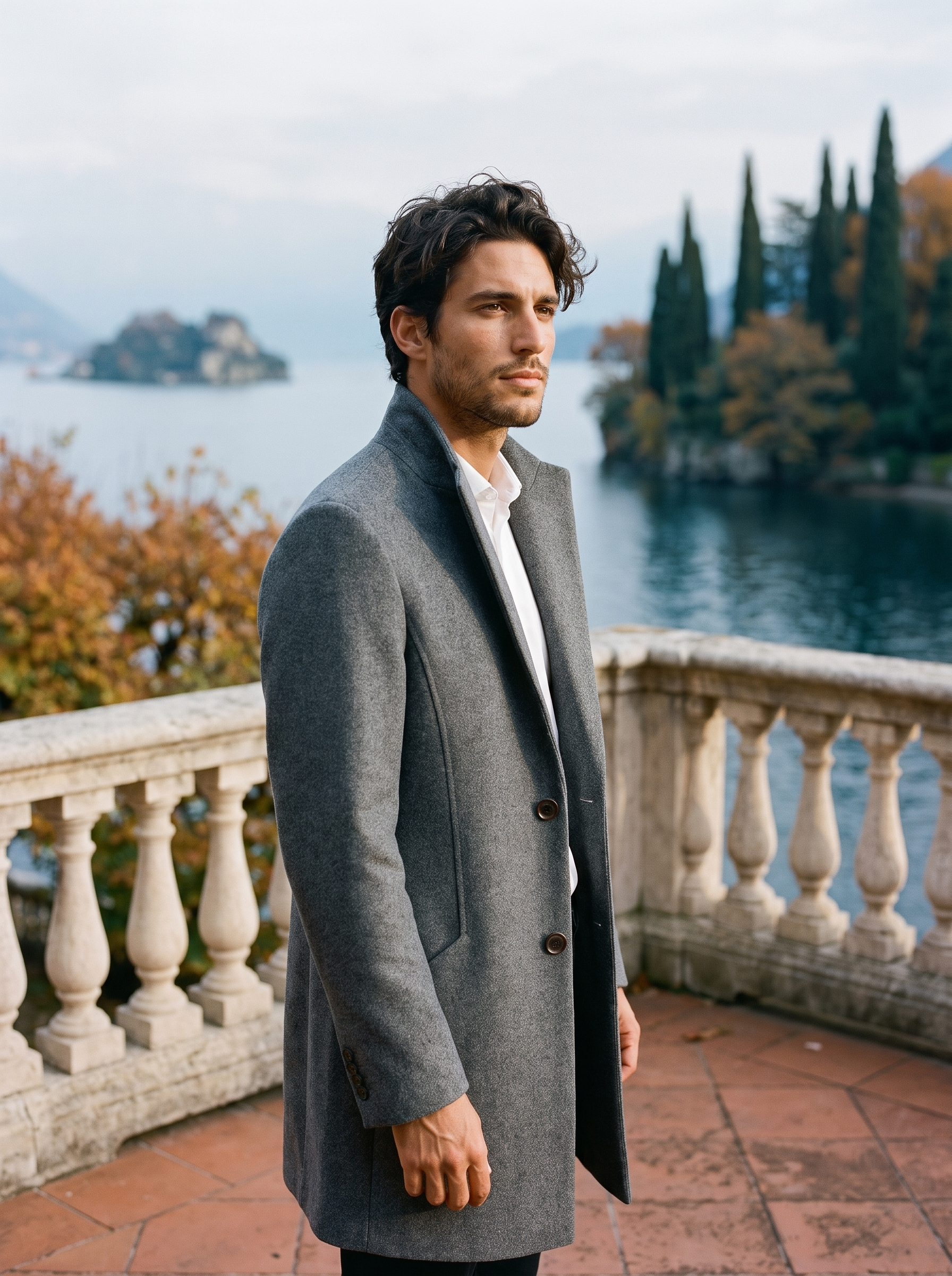 Gray stand collar overcoat for men, worn on a Lake Como terrace — Aveloire