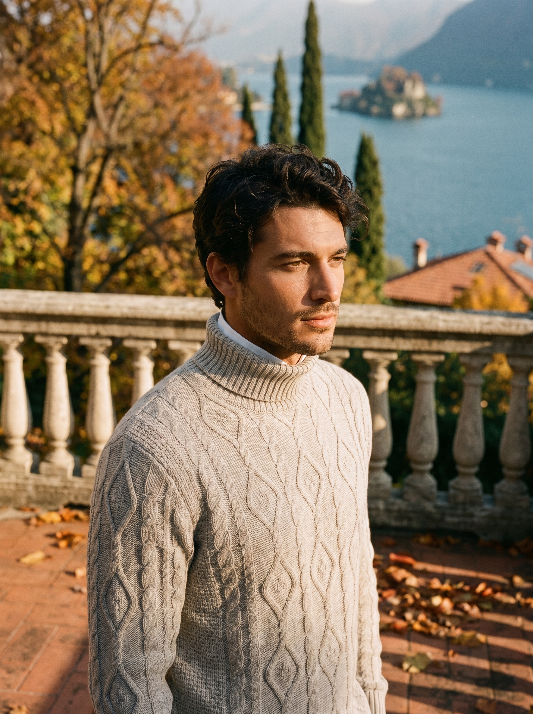 Man wearing a light gray diamond cable knit turtleneck sweater by Lake Como — Aveloire