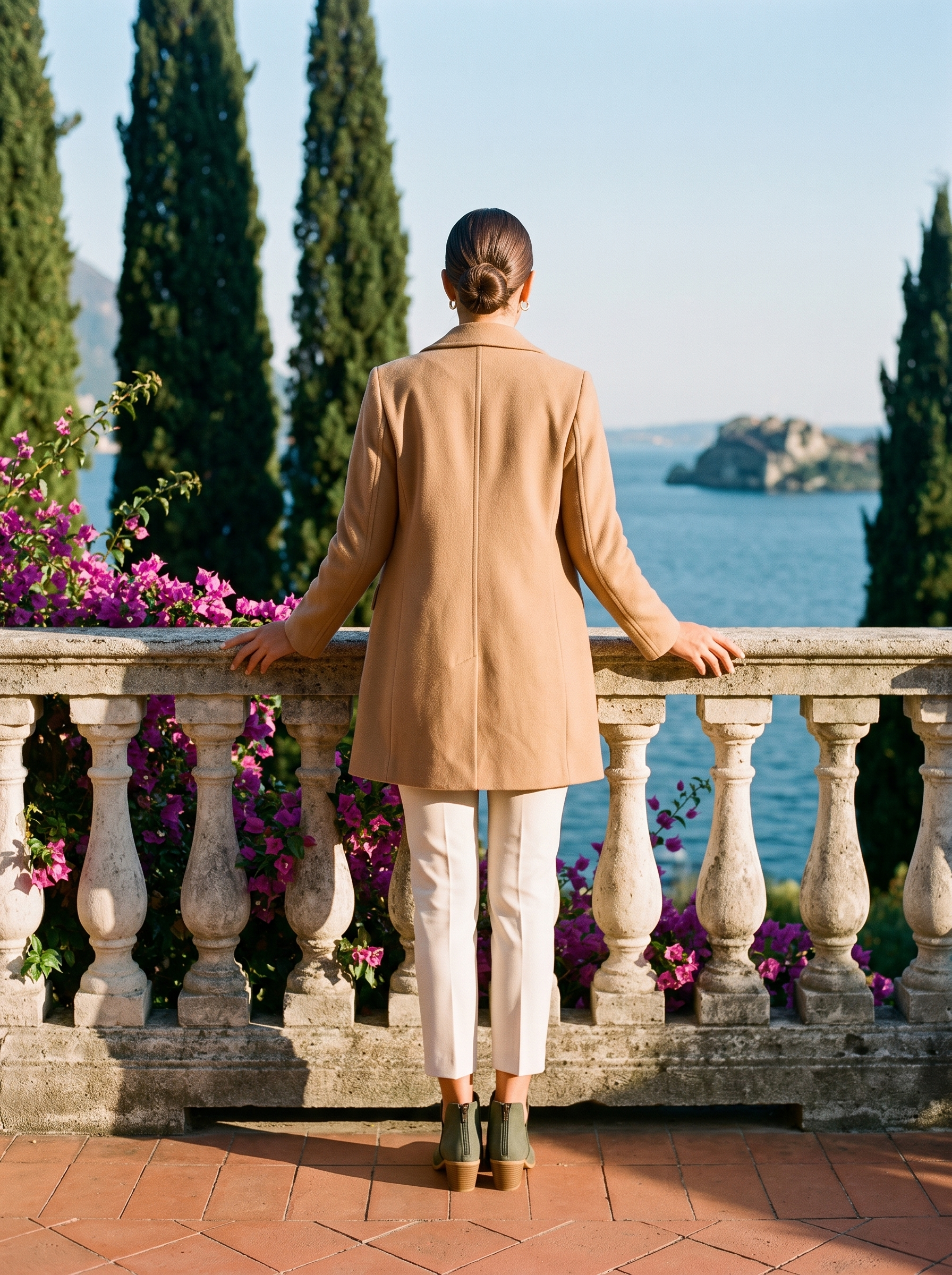 Back view of olive V-cut ankle boots at a Lake Como balustrade — Aveloire